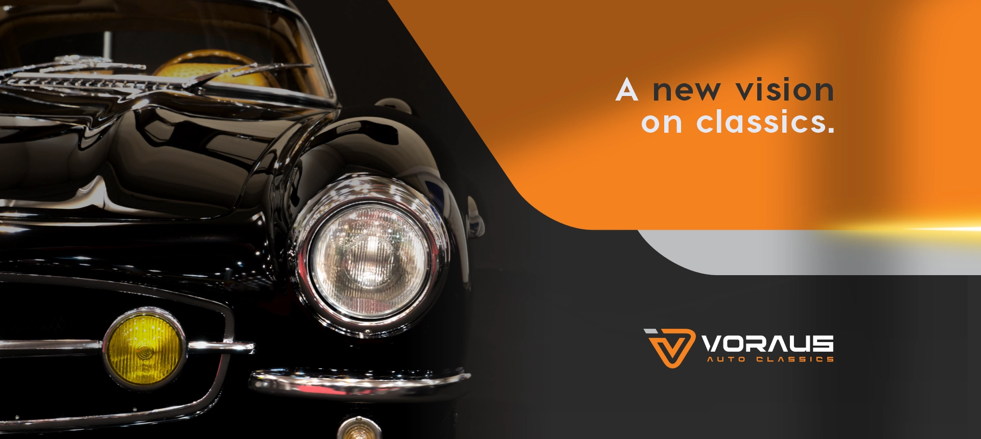 Black classic car with headlights on, highlighting the elegance and originality of Voraus Auto Classics.